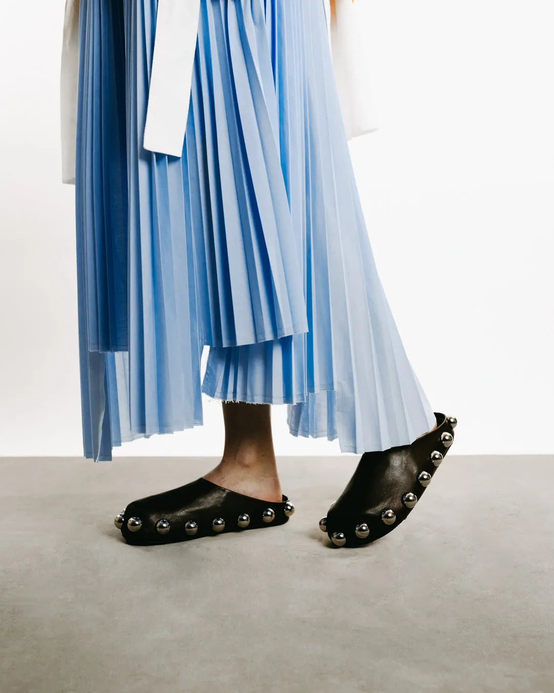 Long Asymmetric Pleated Skirt